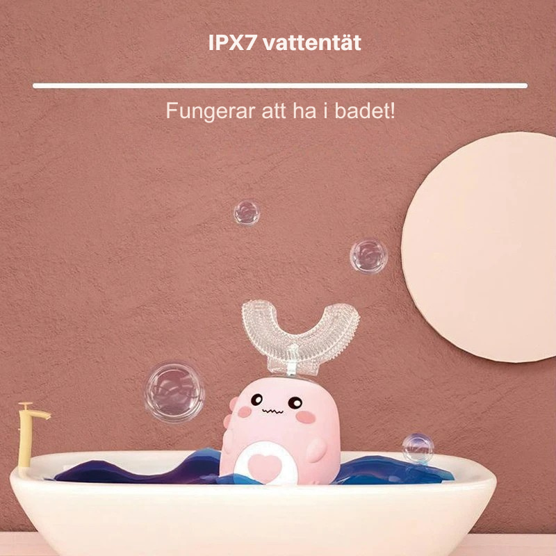 U-formad eltandborste för barn- skrattfest vid tandborstningen och stressen på paus